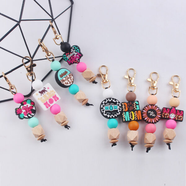 O1CN01xnhXvN1NrNmGrtXFq_2214899881623-0-cib Wholesale Handmade Silicone Beaded Cartoon Mother's Day Keychain