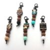 O1CN01xohTvG1bYW5ouJaiy_2216822363477-0-cib Wholesale Cartoon Animal Dwarf English Letter Bull Head Silicone Bead Keychain