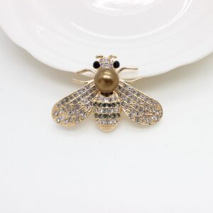 Gold base, brown pearls, white diamonds