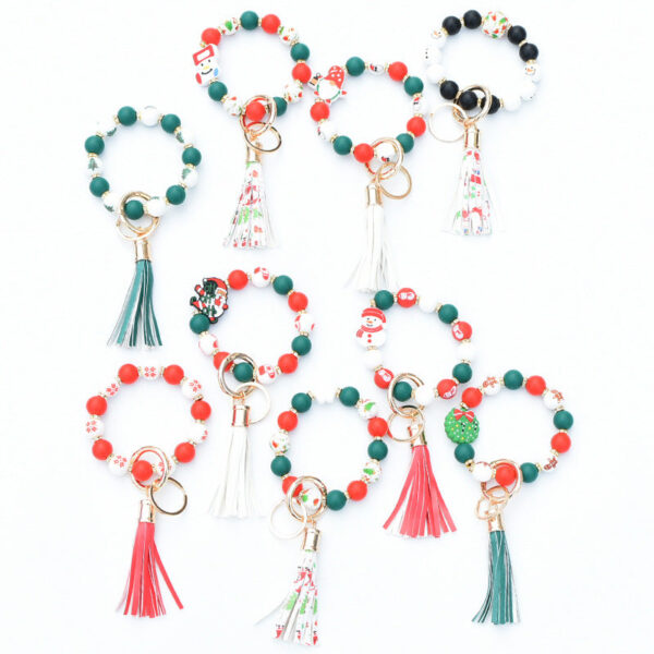 O1CN01yGvBv71N8UtIhoQ2u__2508931525-0-cib Wholesale Christmas Silicone Beaded Leather Tassel Wrist Keychain