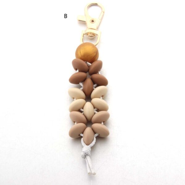 O1CN01yRUlvR1bYW5EiWAgU_2216822363477-0-cib Wholesale Floral Silicone Bead Keychain