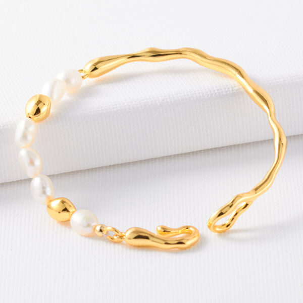 O1CN01ycSNgh1EXNpKT2xT5_3934130361-0-cib Wholesale French Natural Baroque Pearl Asymmetric Stainless Steel Bracelet
