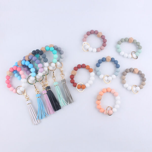 O1CN01yjaWFB1NrNf2l8Jtb_2214899881623-0-cib-2 Wholesale Silicone Beaded Tassel Wrist Keychain