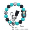 O1CN01ylVPkB1NrNlajJD4z_2214899881623-0-cib Wholesale Cartoon Western Style Cow Head Silicone Beaded Wrist Keychain