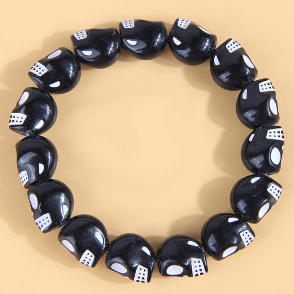 O1CN01zIfwL924CBVuQNTIo__2149317354-0-cib Wholesale Skull Beading Plastic Bracelet