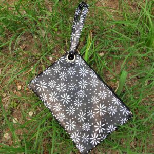 Small white flowers on black background