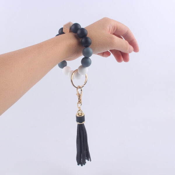 O1CN01zfKsy51NrNf56t1Mg_2214899881623-0-cib-2 Wholesale Silicone Beaded Tassel Wrist Keychain