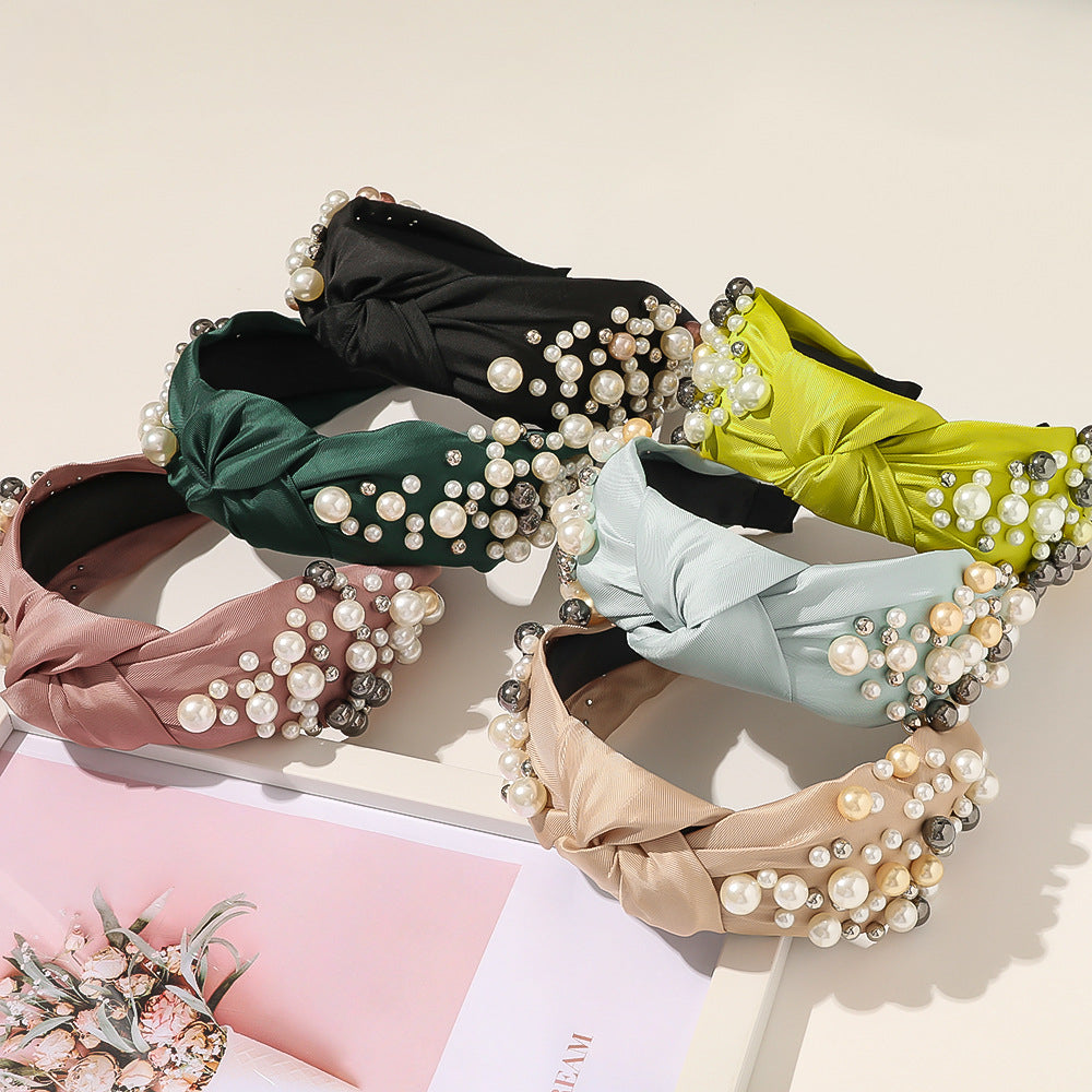 Wholesale of New Pearl Knotted Wide Edged PU Hair Bands