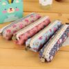oly-26d26bcc86e4291ef33a65732121e11a Wholesale Small Fresh and Elegant Stationery Bag Forest Style Elegant Simple Stationery Box Wave int Floral Pencil Bag