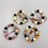 oly-7c1a04efac1ee100ce89a430c331fae0 Wholesale Cartoon Small Animal Yak Silicone Beaded Bracelet Short Tassel Keychain