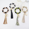 oly-9efb9f7fdde2e26f800fc966f818ab49 Wholesale Silicone octagonal rubber paint round bead keychain