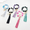 oly-c959621d3893a2d09dfafbb886c9c312 Wholesale Beaded Silicone Cross Leopard Print Wooden Bead Keychain