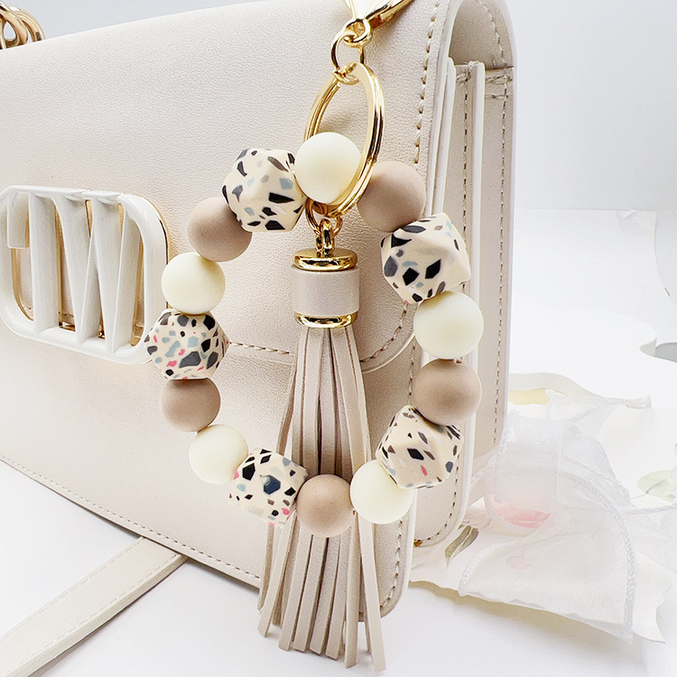 Wholesale Silicone octagonal rubber paint round bead keychain