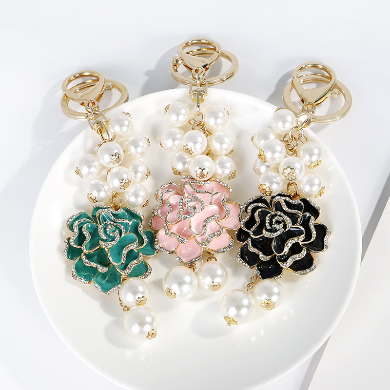 Wholesale Flower series oil ipping diamond inlaid camellia metal keychain