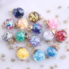 Wholesale Colored transparent star glitter crystal glass ball beads