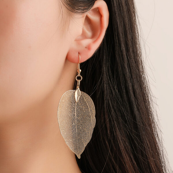 Wholesale Vintage white long hollowed out leaf earrings