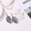 Wholesale Vintage white long hollowed out leaf earrings