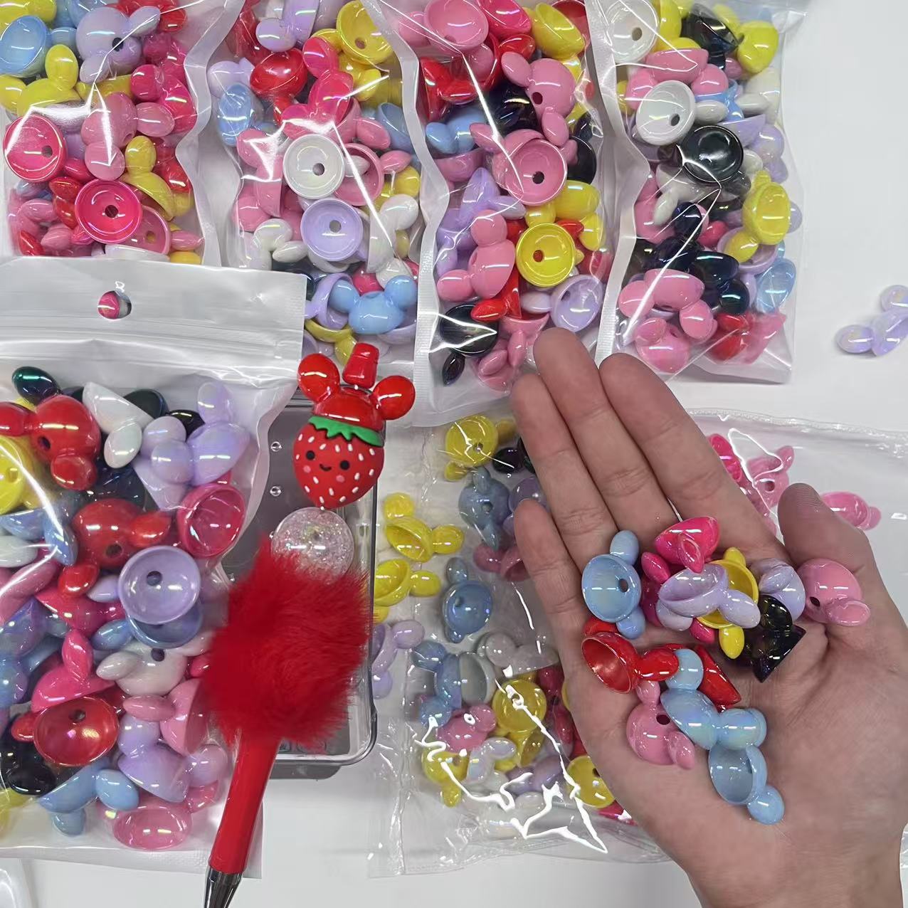 Wholesale Mix UV Coated Acrylic Cartoon Head Macaron Color Straight Hole Beads or 3D Strawberry Silicone Focal Beads