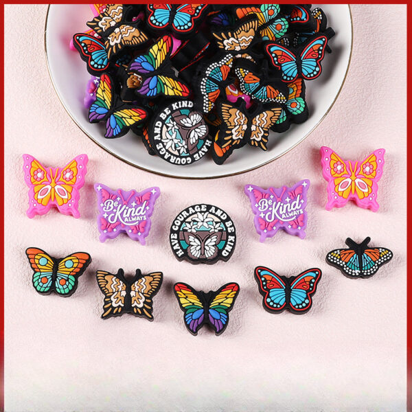 65fc313f80c42d5331a9a2f04f2c6577 Wholesale 20pcs Two tone Butterfly Silicone Children's Dental Adhesive Anti drop Chain English Letter Silicone Beads