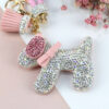 9392937610_231650873 Wholesale Pink diamond studded cartoon cute dog keychain