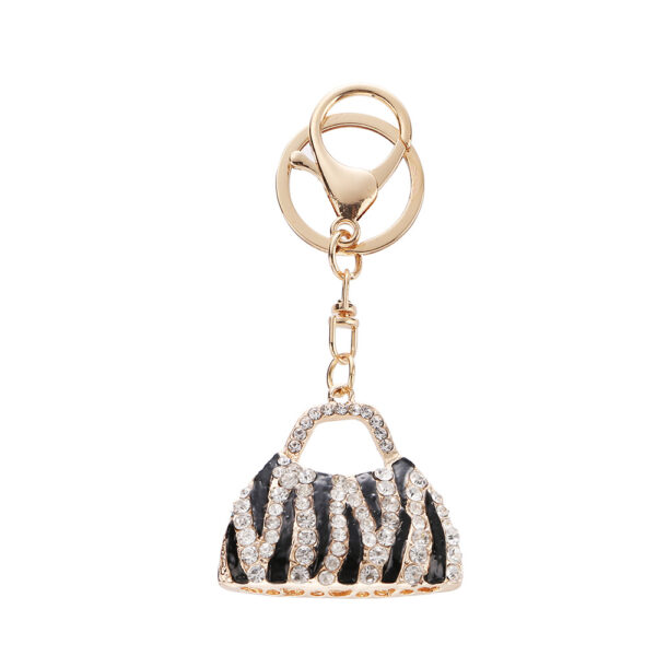 O1CN01080xnT27Kq2sn9DDc_2218648477779-0-cib Wholesale Rhinestone Leopard Print Creative Bag Car Keychain