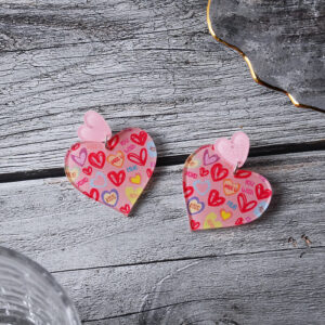 Pair of pink love earrings