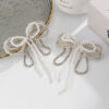 Wholesale Pearl bowknot diamond-encrusted chain tassel necklace