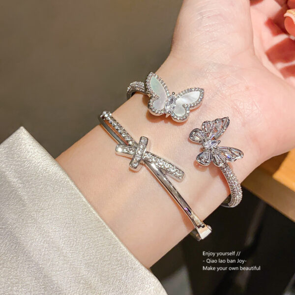 Wholesale Butterfly studded diamond cross buckle bracelet