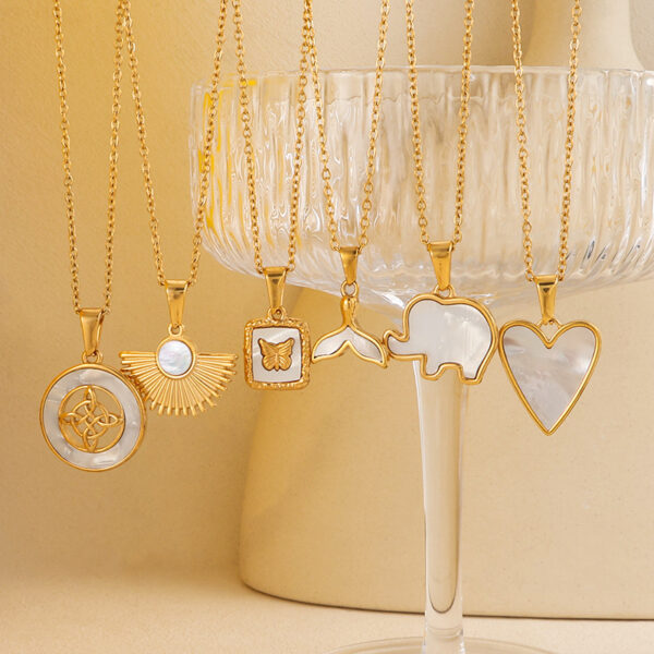 Wholesale Love tailed unicorn elephant fan-shaped white shell mother pendant