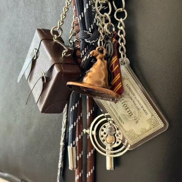 O1CN011uav7i27fuEQQElp0_2214234377825-0-cib Wholesale Magic Wizard Hat Magic Wand Series Alloy Keychain