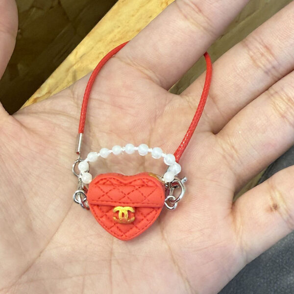 O1CN012NU8gr29F0HWZvEaK_2216239028037-0-cib Wholesale dollhouse plush toy pendant, 3D resin DIY jewelry, mini -style bag