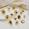 O1CN012WQzrT29BL7muD5sE_2211762048029-0-cib Wholesale Stainless steel ring with tiger's eye setting