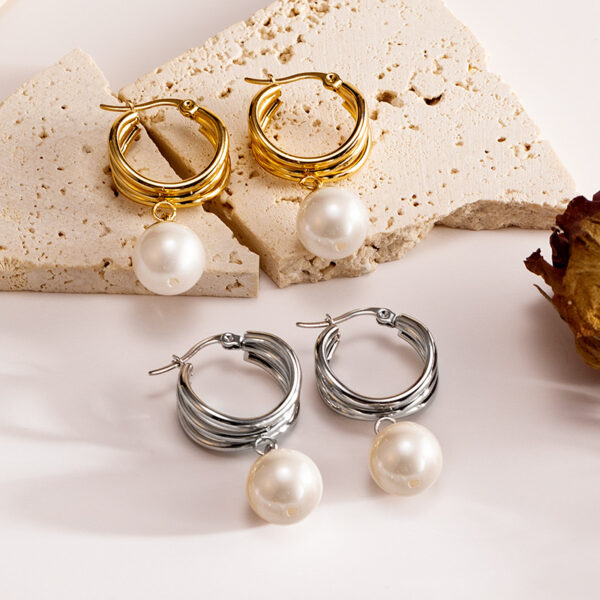 Wholesale Fashionable high-end design pearl pendant earrings