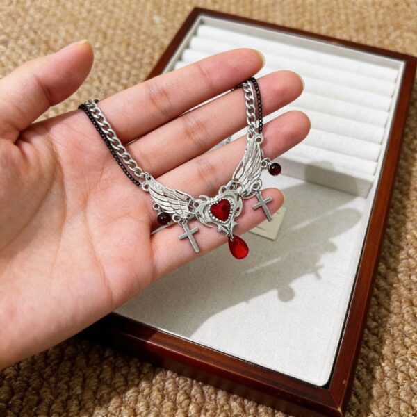 O1CN012ZXR6V1OnYEjsWDyy_2209731171750-0-cib Wholesale Sweet Cool Red Angel Wings Gothic Cross Tassel Necklace