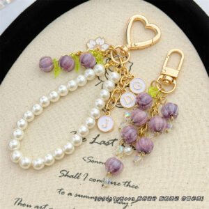 Wholesale Purple glazed bell orchid pearl chain keychain
