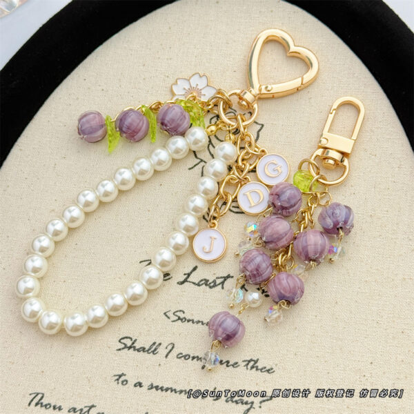 Wholesale Purple glazed bell orchid pearl chain keychain