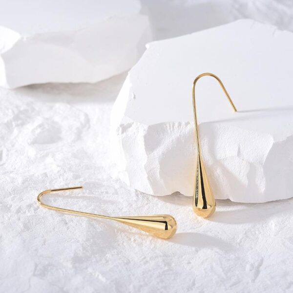 Wholesale Stainless steel stud earrings with gold-plated teardrop round beads