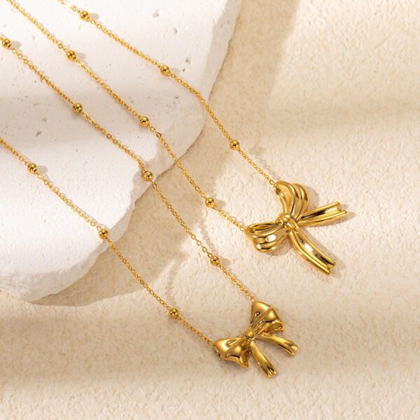 Wholesale titanium steel necklace gold luxury creative bow necklace