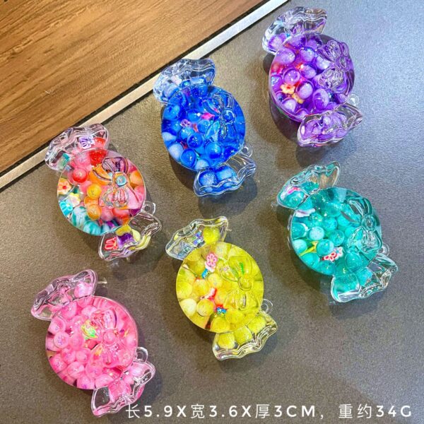 Wholesale Cute colorful candy-filled desktop ornament, quicksand bottle accessory, acrylic keychain, bag charm, small gift.