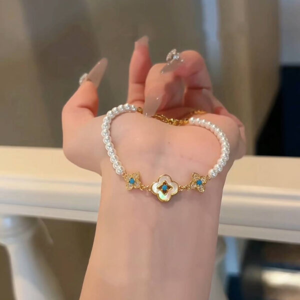 Wholesale Turquoise bead layered metal flower bracelet