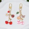 Wholesale Cherry butterfly ladybug daisy green leaf keychain Y2K bag pendant