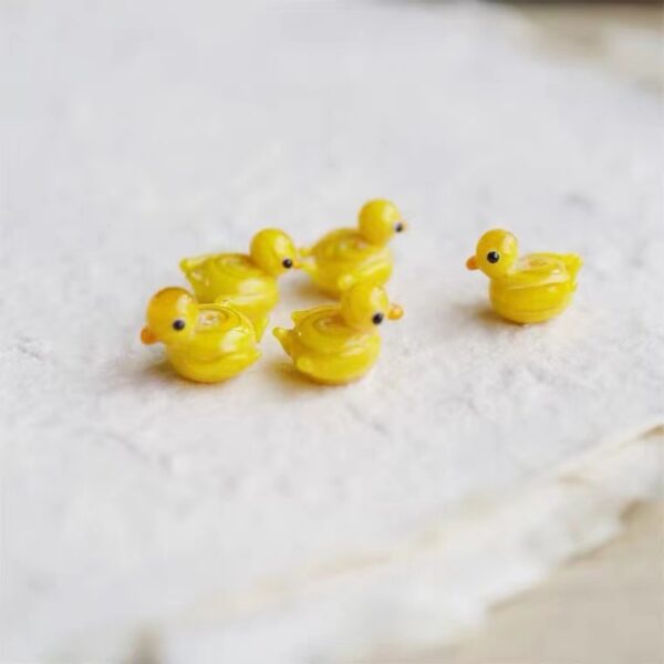 O1CN013PV4LH1hINbr3pU5s_2213857894254-0-cib Wholesale Small yellow duck creative Beads