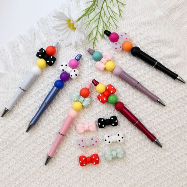 O1CN013TMZ4w2FO3hCiQUWu_2216349148869-0-cib Wholesale 10pcs 3D Black Dot Red Dot Bow New Three-dimensional Silicone Cute Cartoon DYI Beads