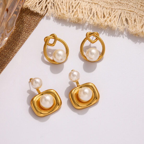 O1CN013aJhTY1P9XFhY1hYH_2218506891798-0-cib Wholesale Cross-border titanium steel pearl stud earrings, light luxury, unique shell design, simple and versatile small women's earrings, wholesale available.