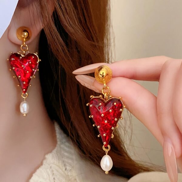 Wholesale Half transparent red tassel heart-shaped earrings