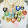 O1CN013jiOYW2LRcXqKBBF0_4115849689-0-cib Wholesale Golden Rice Bead Love Pendant Necklace
