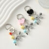 Wholesale Colored bead heart shaped bow metal keychain