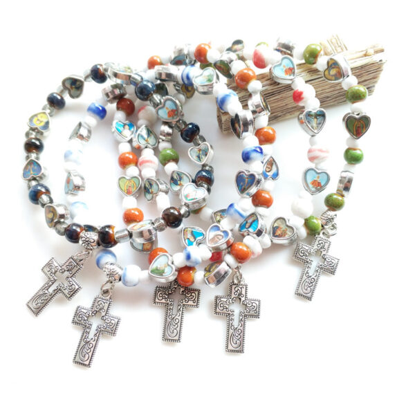 O1CN013mpcNY1RxZioIwvIE_2220646552178-0-cib Wholesale Colorful ceramic hollowed-out cross elastic bracelet