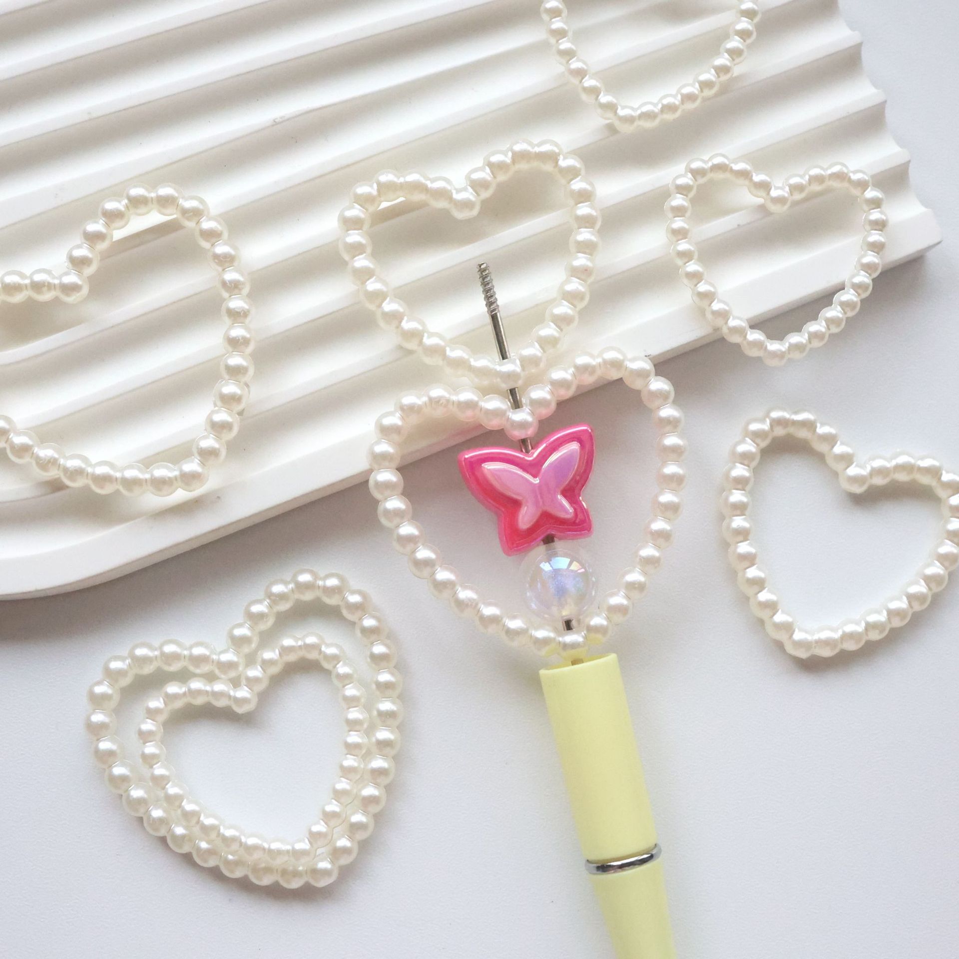 Wholesale pearl hollow large love heart straight hole pearl DIY beads