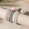 O1CN0140aKi21ZBV0Uhfw2A_2925713156-0-cib Wholesale Bow colored pearl multi-layer layered bracelet